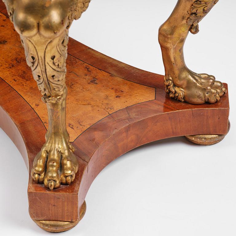 A presumably Austrian Empire centre table, early 19th century.