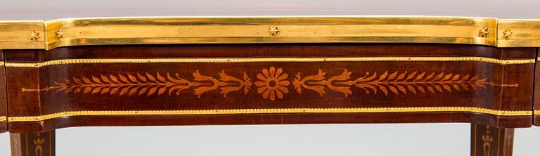 A Directoire style marquetry table from around year 1900.