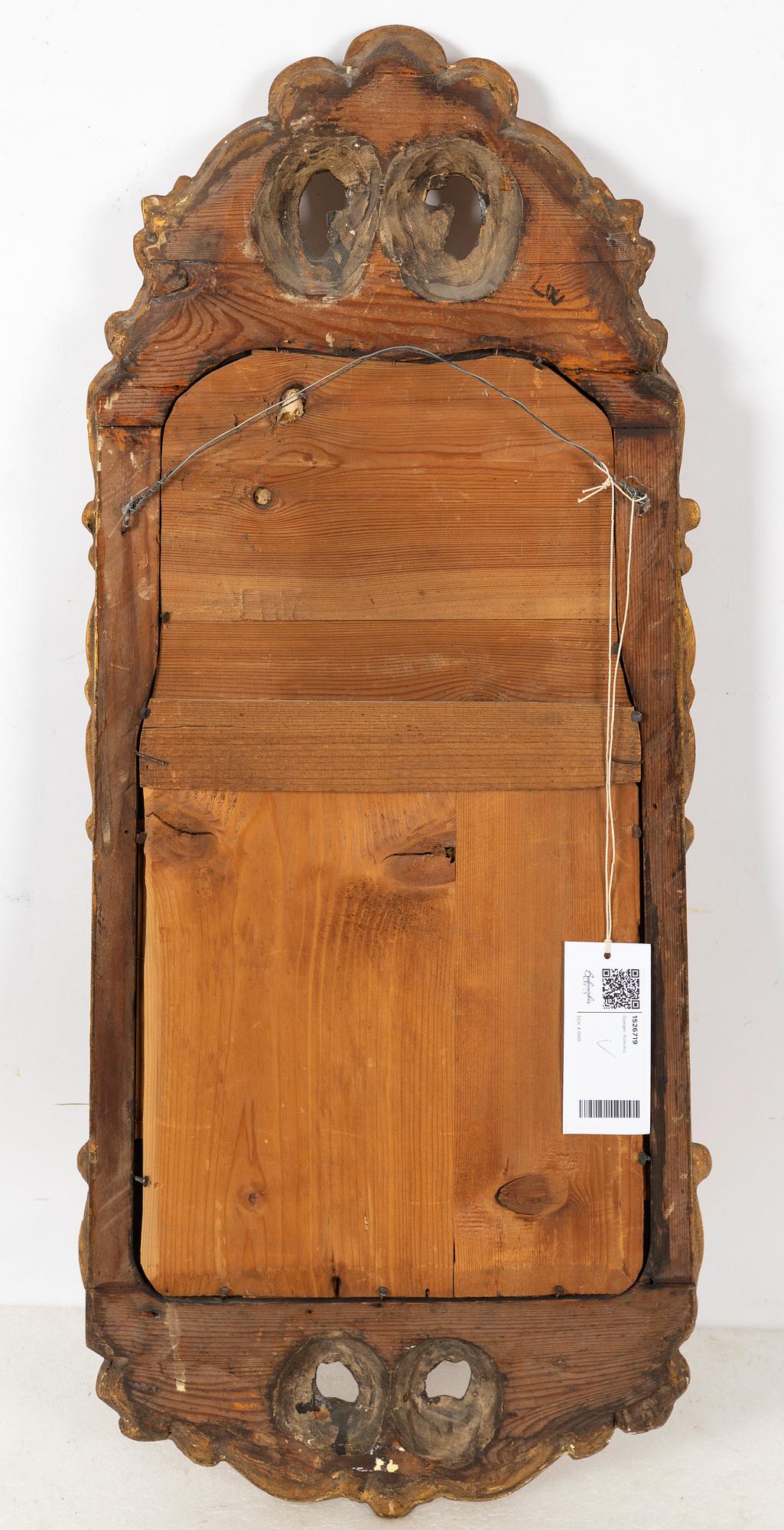 A Rococo mirror, 18th Century.