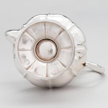 A silver coffee pot, a parcel-gilt sugar bowl and cream jug, Turku Finland 1946 and 1985.