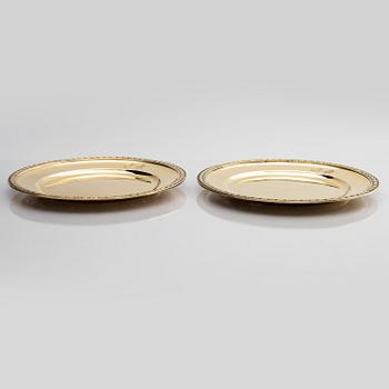 Twelve silver-gilt plates, mark of company C.G. Hallberg, Stockholm 1913-1917.