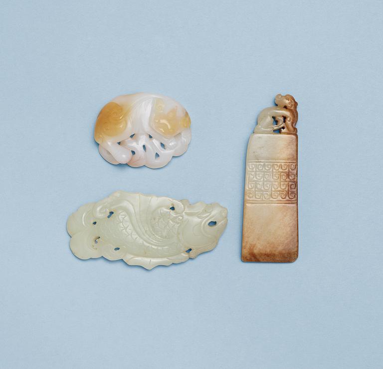 Two nephrite and one agate carvings, Qing dynasty.