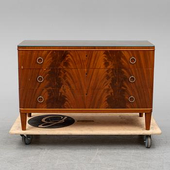 A chest of drawers, mid 20th century.