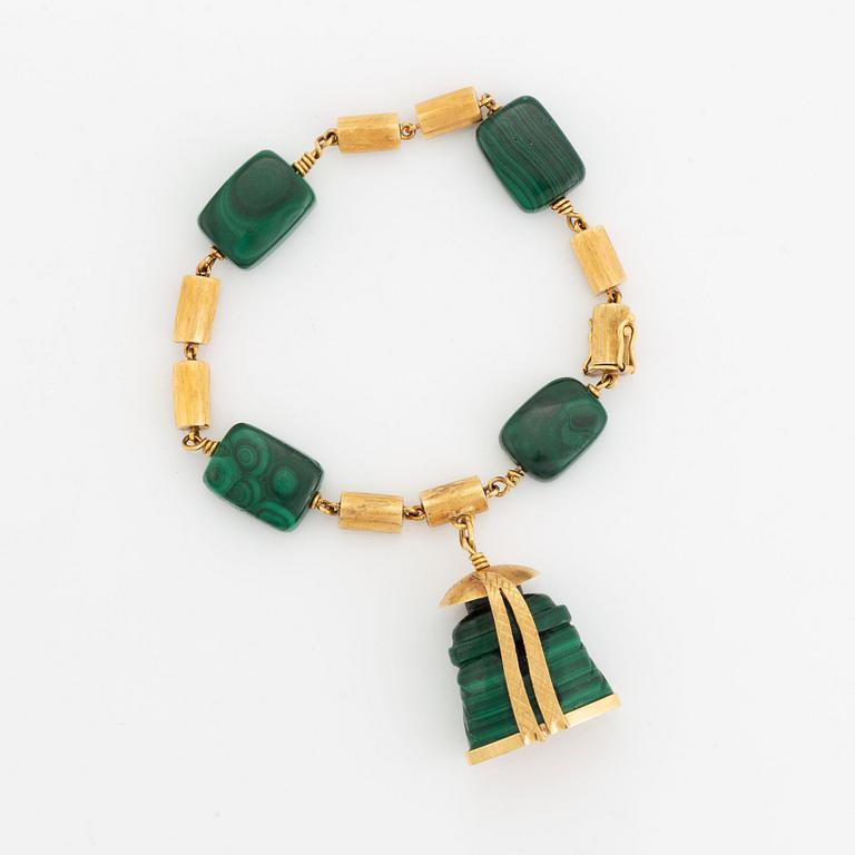 A 14K gold and malachite bracelet.