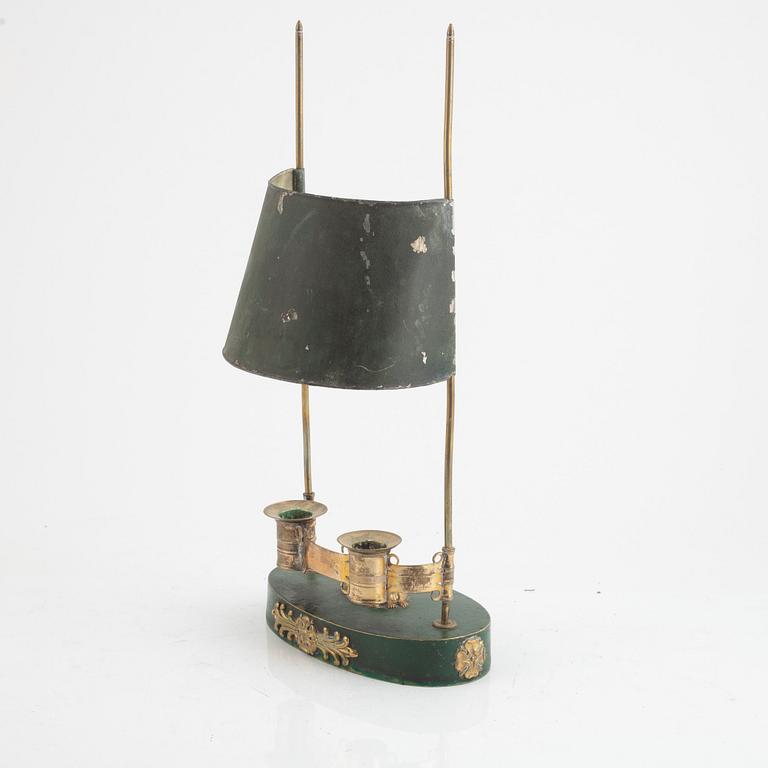 A swedish Empire two-light gilt-brass and tôle-peinte reading lamp, early 19th century.