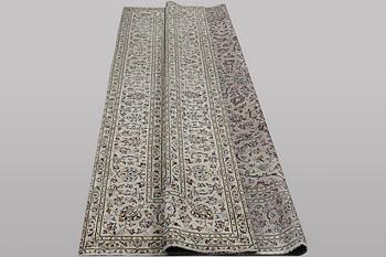 A carpet, Kashan, ca 328 x 205 cm.