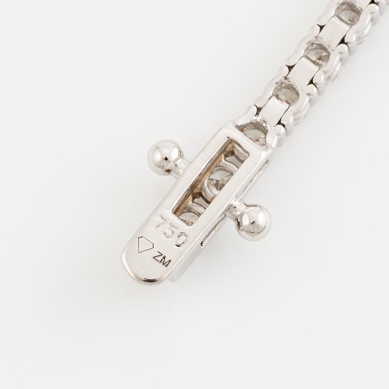 Tennis bracelet 18K white gold with brilliant-cut diamonds.