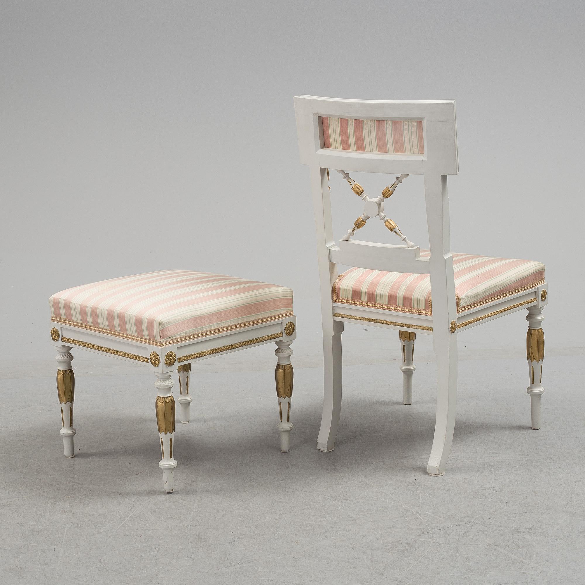 A set of two armchairs, a sofa, a stool and a chair. Early 20th century.