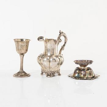 Cream jug, bowl on foot, and a cup, early to mid-19th century.