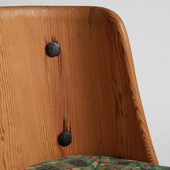 Axel Einar Hjorth, a stained pine "Lovö" chair, Nordiska Kompaniet, Sweden, 1930s.