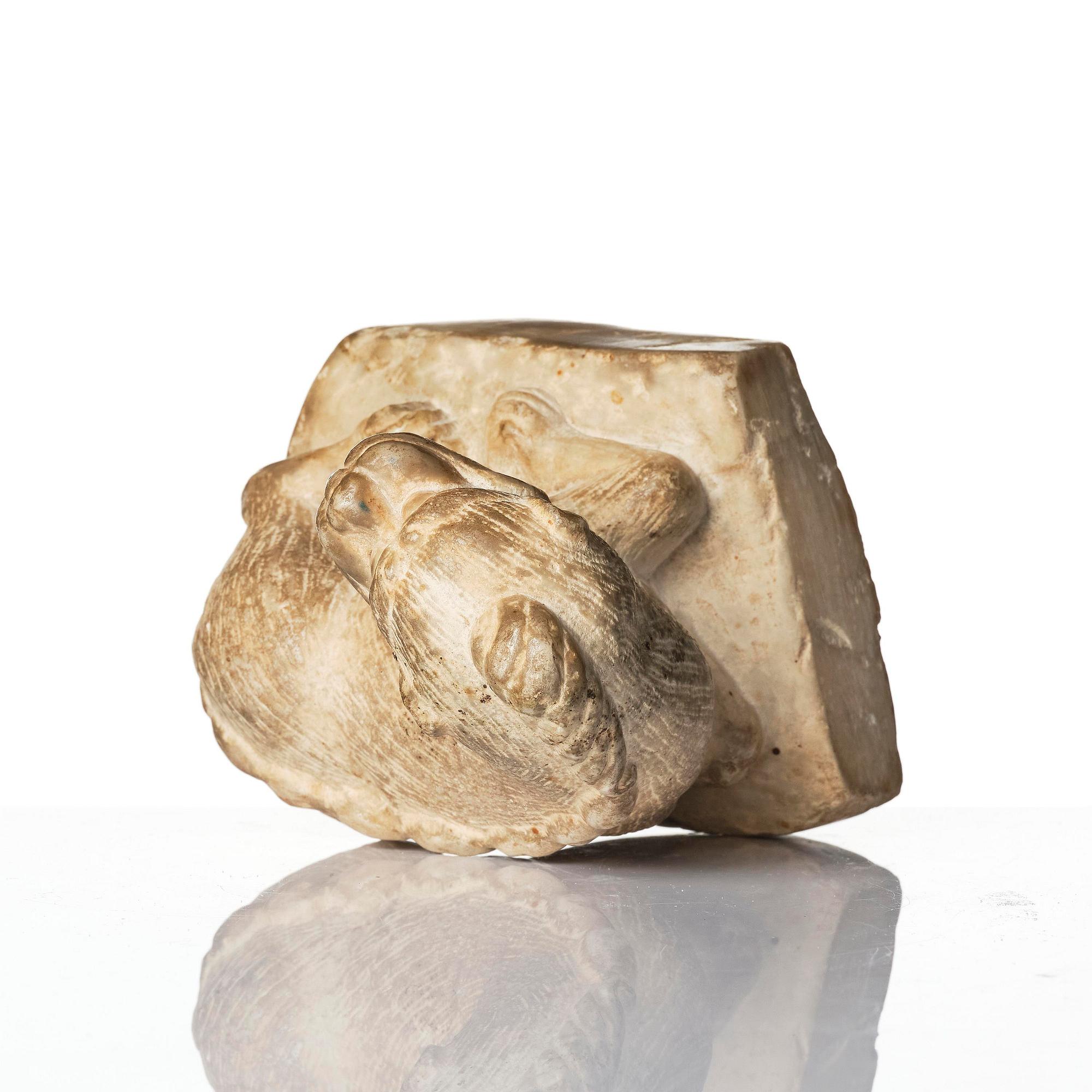 A stone figure of a mythical beast, probably Tang dynasty (618-907).