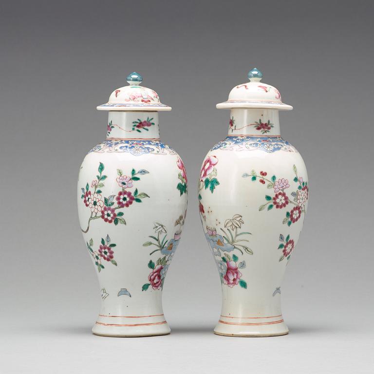 A pair of famille rose vases with covers, Qing dynasty, Qianlong (1736-95).