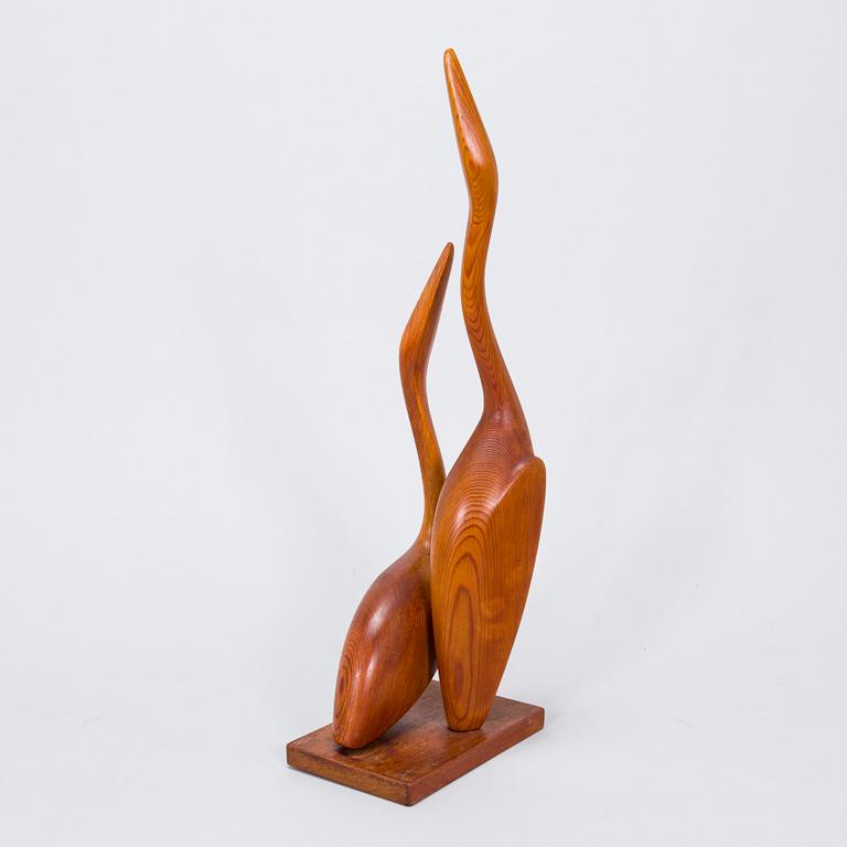 Sakari Pykälä, a wooden sculpture, signed and dated -61.