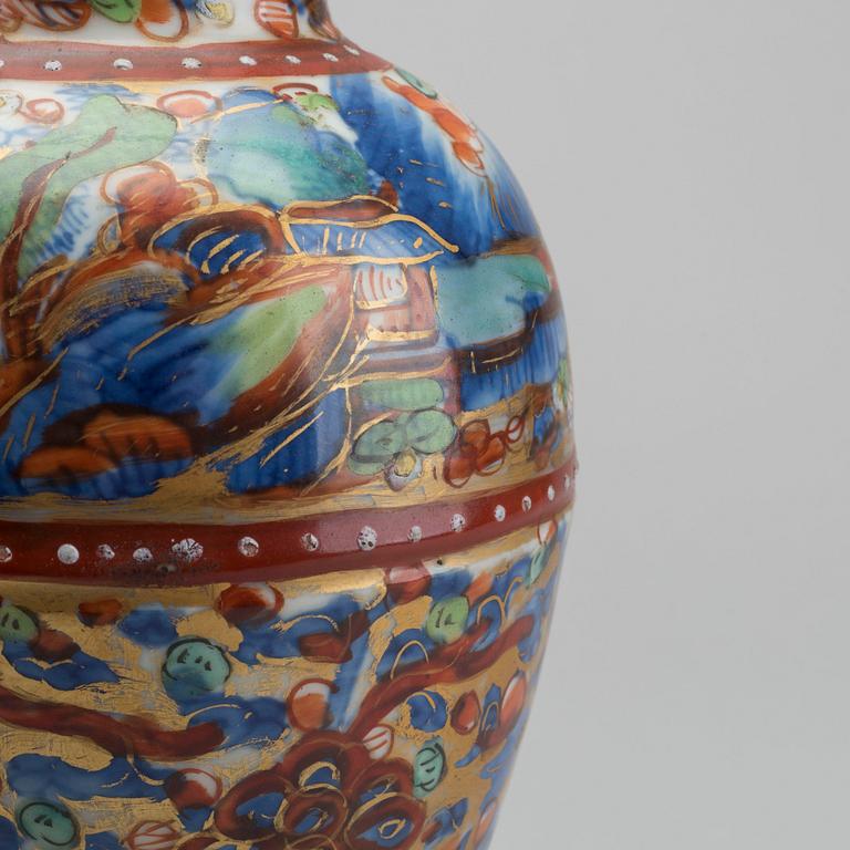 A Chinese clobbered 18th century porcelain vase, height ca 24 cm.
