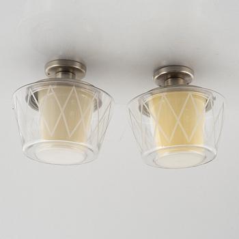 Harald Notini, taklampor, ett par, modell "11197", Arvid Böhlmarks Lampfabrik, Stockholm, 1940-50-tal.