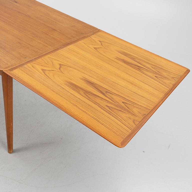 A teak-veneered dining table, 1960's/70's.