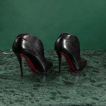 A pair of shoes by CHRISTIAN LOUBOUTIN, in size 37.