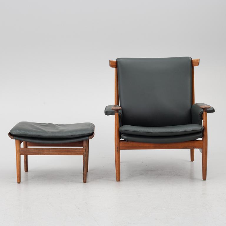 Finn Juhl, a 'Bwana' armchair and ottoman, France & Son, Denmark, 1960's.