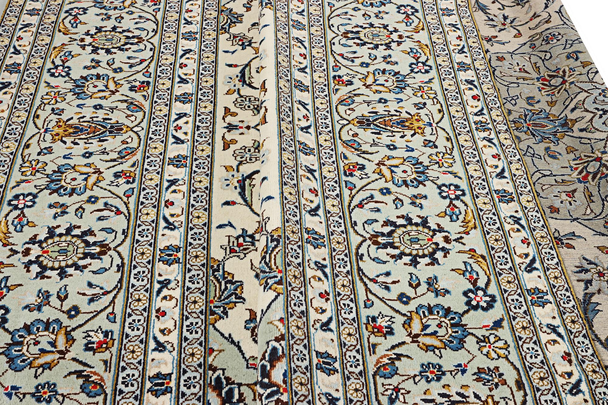 A Kashan carpet, c. 400 x 290 cm.
