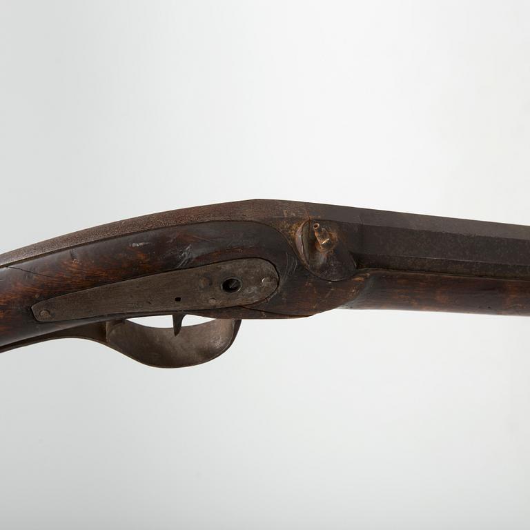 A mid 19th century percussion rifle.