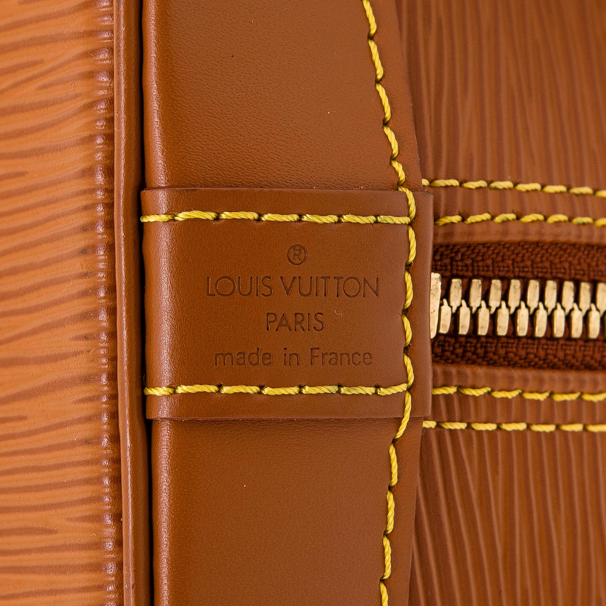 Louis Vuitton, an Epi Leather "Alma" bag.