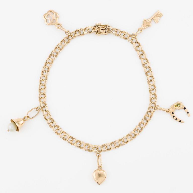Bracelet, 18K gold with charms.