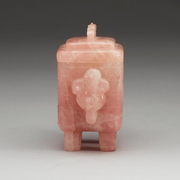 A dragon-shaped rose quartz box with cover, China.