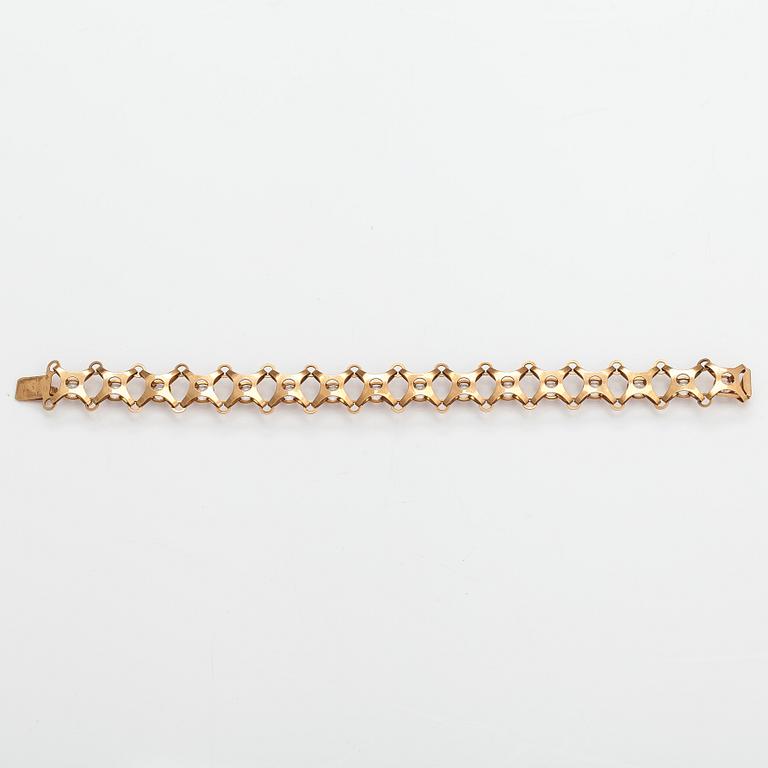 A 14K gold bracelet with synthetic spinels. Pentti KEvätlahti, Turku 1969.