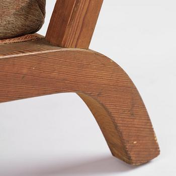 Axel Einar Hjorth, a stained pine "Väddö" easy chair, Nordiska Kompaniet, Sweden, 1930s-40s.