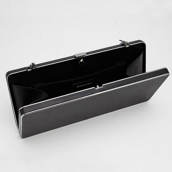 JIL SANDER, an black evening bag/clutch.