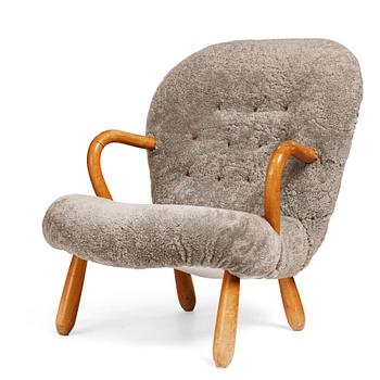 A Swedish Modern "Clam Chair", Sune Johanssons Möbelfabrik, Nässjö Sweden 1940-50's.