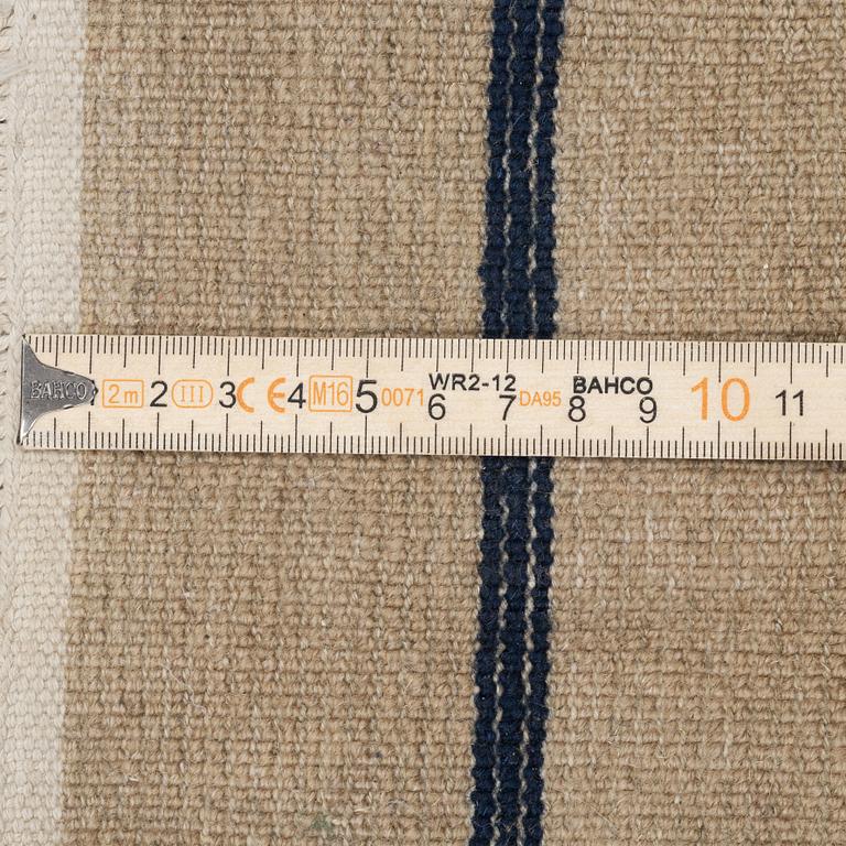 A semi-antique pictoral Chinese rug, approx. 240 x 170 cm.