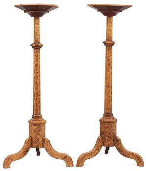 566. A pair of Swedish late Baroque 18th century candle stands.
