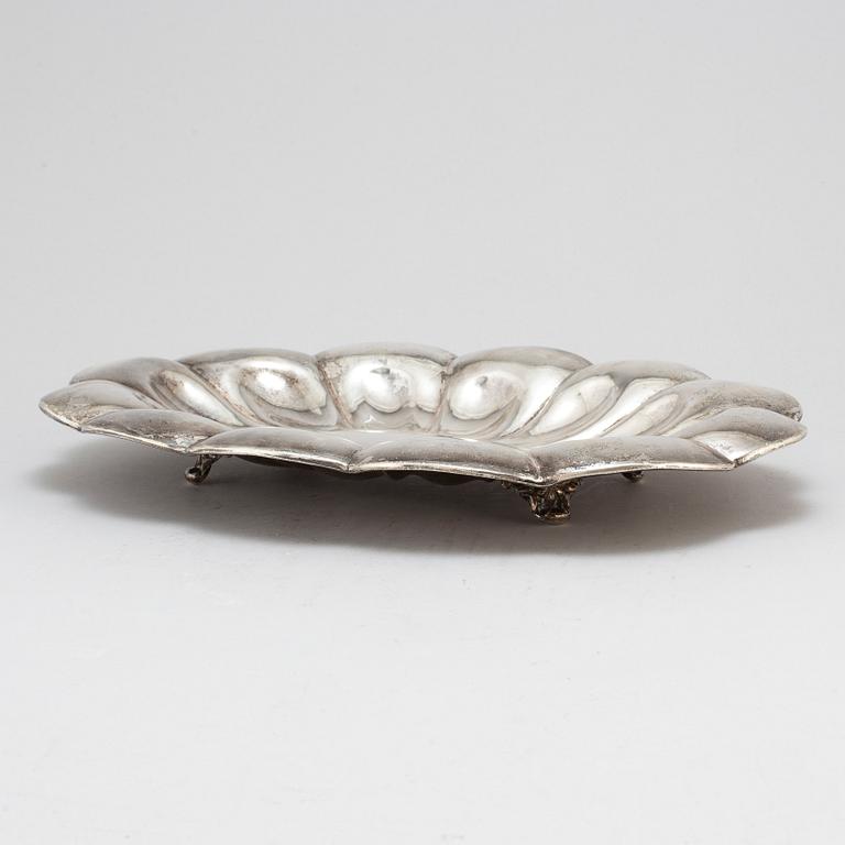 A silver plate, 20th century.