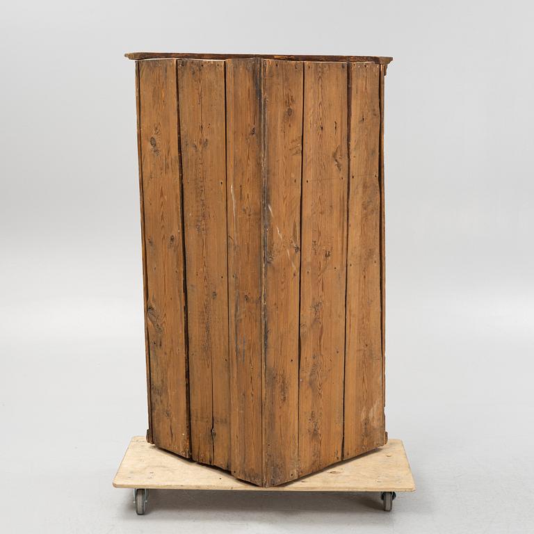 An early 19th Century provincial corner cabinet.