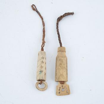 Two needle cases, one dated 1936.