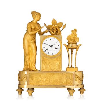 126. An Empire ormolu mantel clock, 'Allegory of the birth of the Duke of Bordeaux', early 19th century.