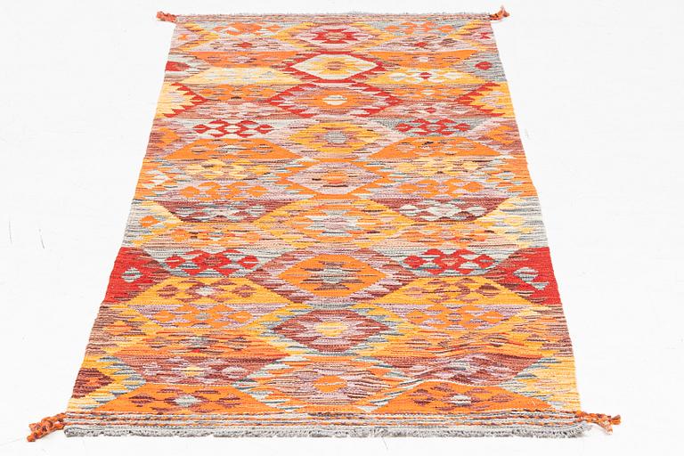 A Kilim runner, c. 255 x 85 cm.
