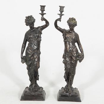 Auguste Moreau after a pair of sculptures/candle sticks patinated bronze.