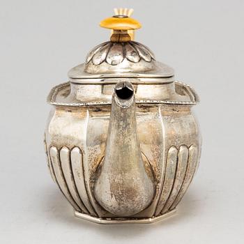 A Russian 19th century parcel-gilt silver tea-pot, St.Petersburg.