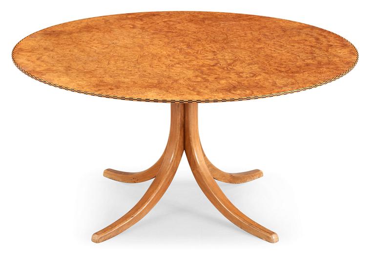 A Josef Frank mahogany and burrwood dining table, Svenskt Tenn, model 1020, checkered edges.