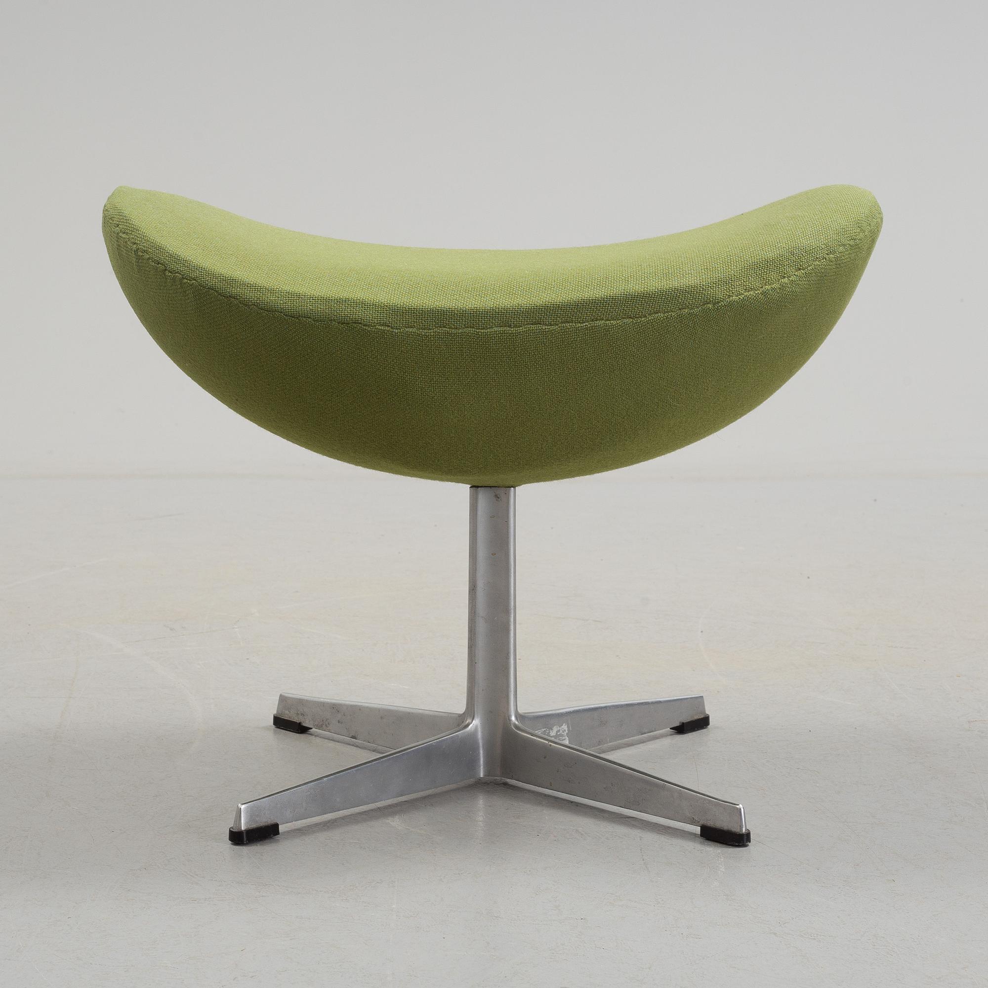 A Arne Jacobsen "Svanen" armchair and stool, second half of the 20th century.