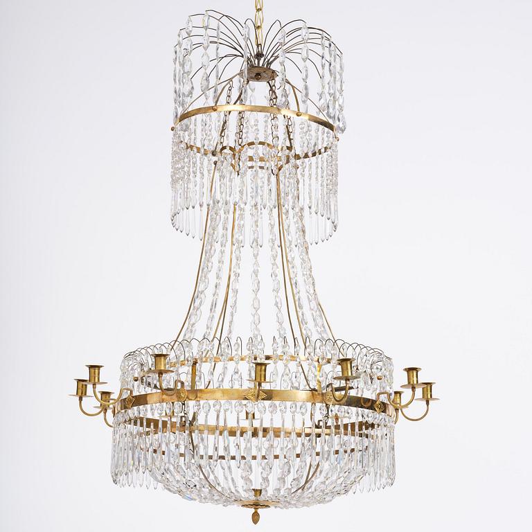 A late Gustavian thirteen-light gilt brass and cut glass chandelier, Stockholm, late 18th century.