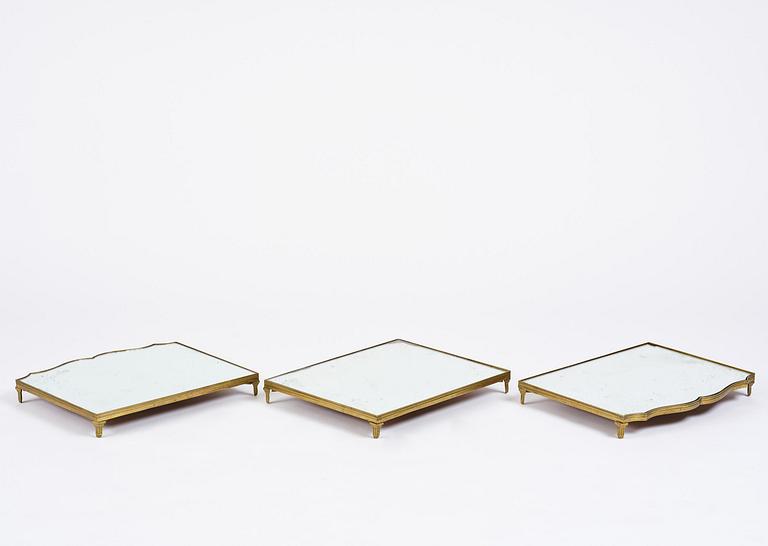 A Gustavian three-piece brass and glass surtout de table, Stockholm, later part 18th century.