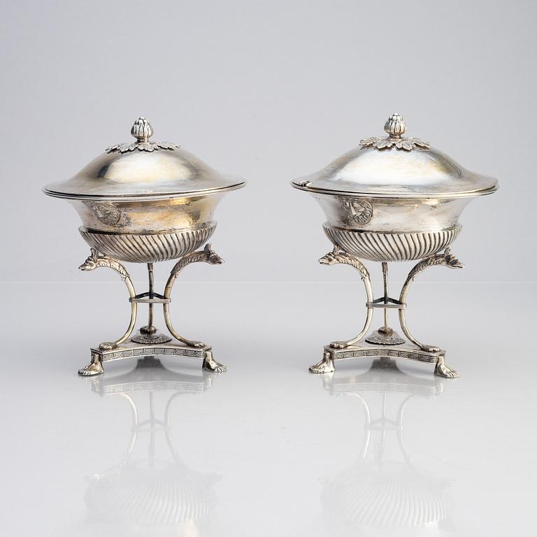 A pair of Swedish early 19th century silver suger bowls with lids, marks of Johan Fredrik Björnstedt, Stockholm 1818.