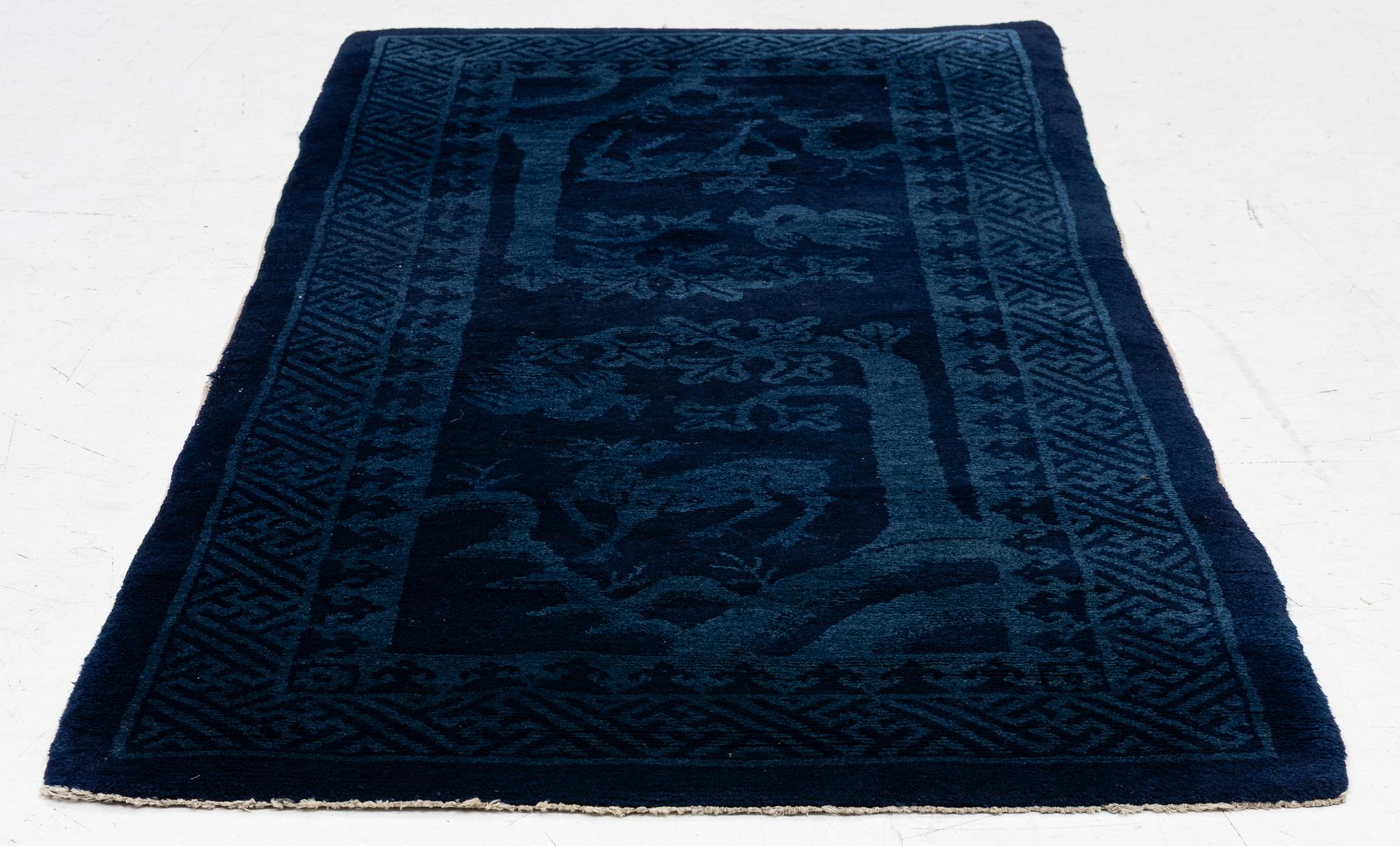 An antique Baotou rug, North China, c 157 x 75 cm.