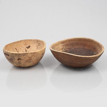 Four wooden bowls and two plates, Sweden, 19th/20th century.