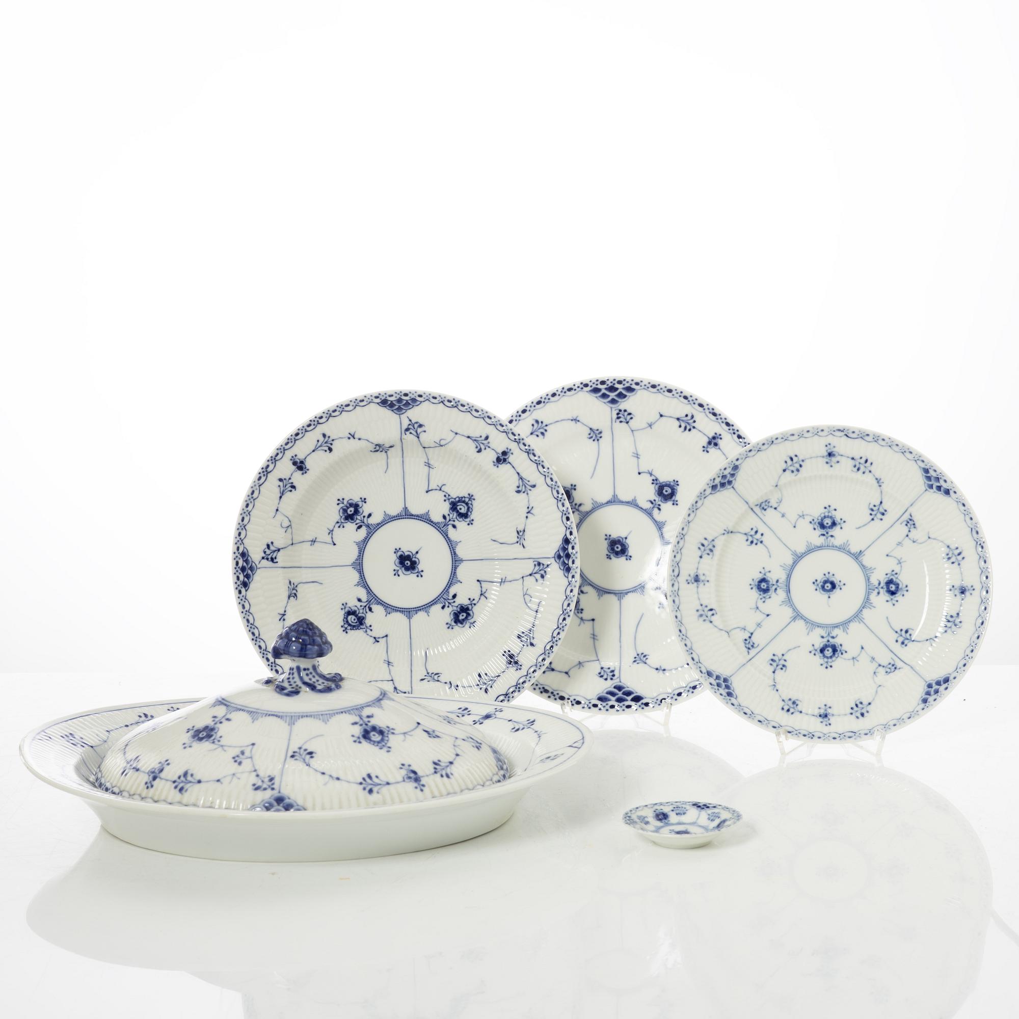 Royal Copenhagen, 35 pieces of a porcelain 'Blue Fluted' half lace dinner service, Denmark, 1889-1978.