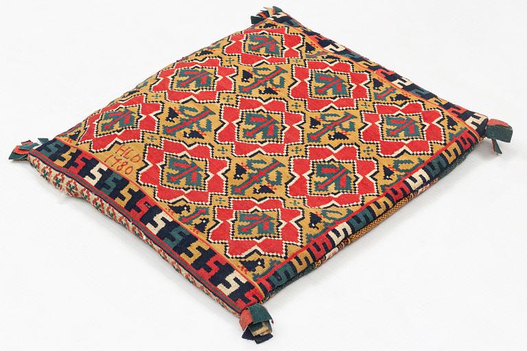 A double-interlocked tapestry carrige cushion, ca 64 x 57 cm, Scania, probably from the period 1780-1820.