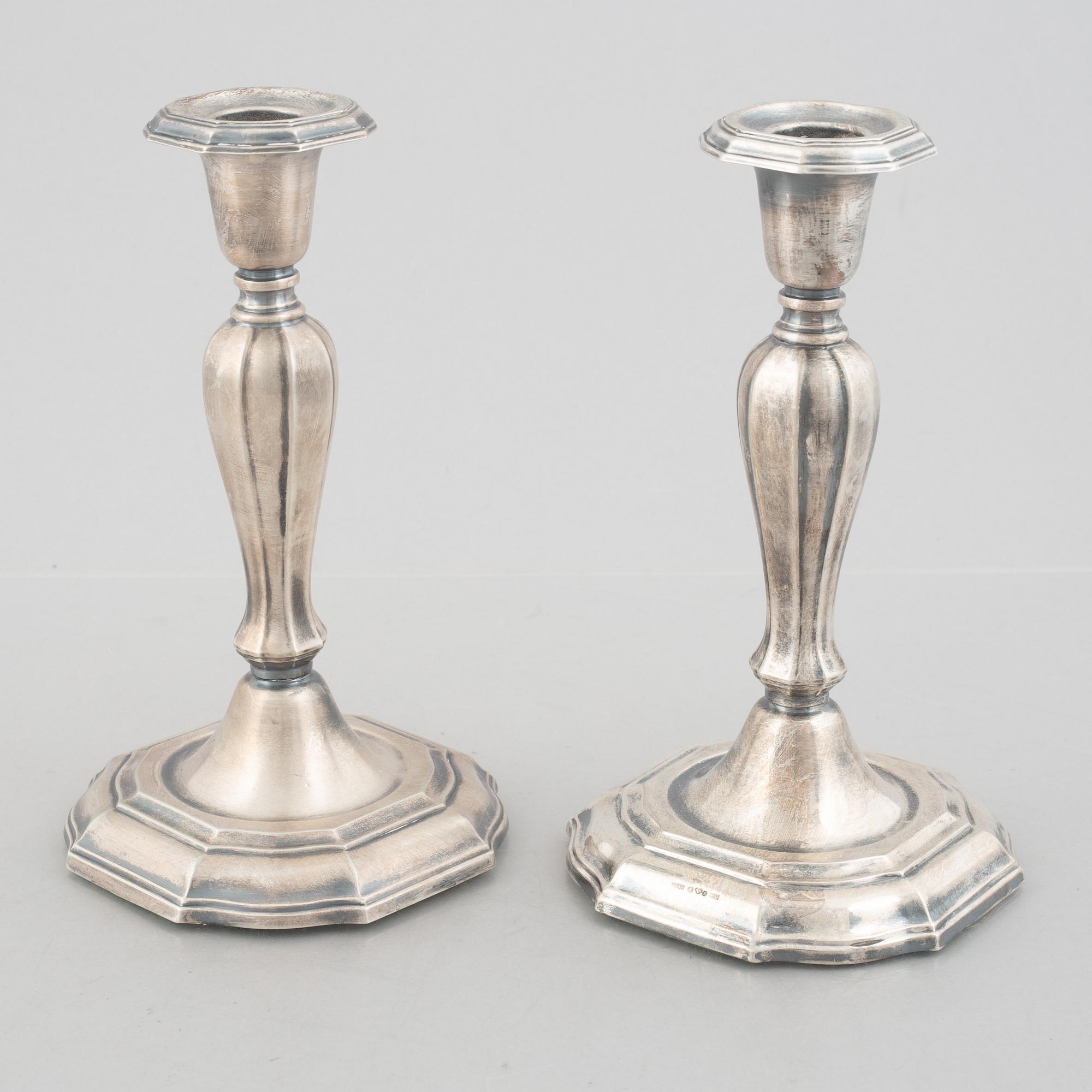 Two pairs of Swedish silver candlesticks, including Eric Löfman, MGAB, Uppsala 1979-1982.
